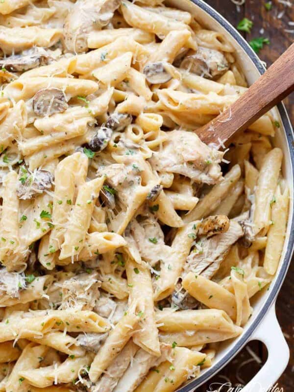 Seared chicken strips mixed through this One-Pot Creamy Mushroom Chicken Pasta, with garlic, mushrooms AND parmesan cheese